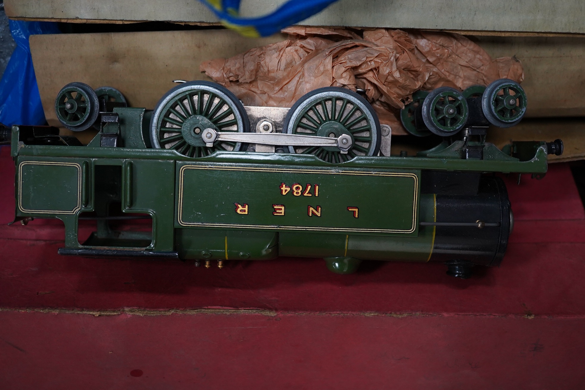 A collection of Hornby 0 Gauge tinplate railway including; a No.2 Special LNER 4-4-2T locomotive for three rail electric running, 1784, two boxed No.2 LNER teak Corridor Coaches, a boxed No.2 Lumber wagon, four freight w